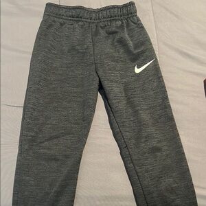 Nike Gray Sweatpants with Elastic Waistband and Fleece Material